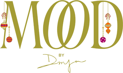 Mood by DMJ holiday logo with glass Christmas ornaments hanging from the M and D