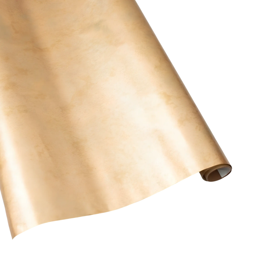 Antique gold foil wrapping paper roll with a softly burnished, vintage-inspired metallic shimmer
