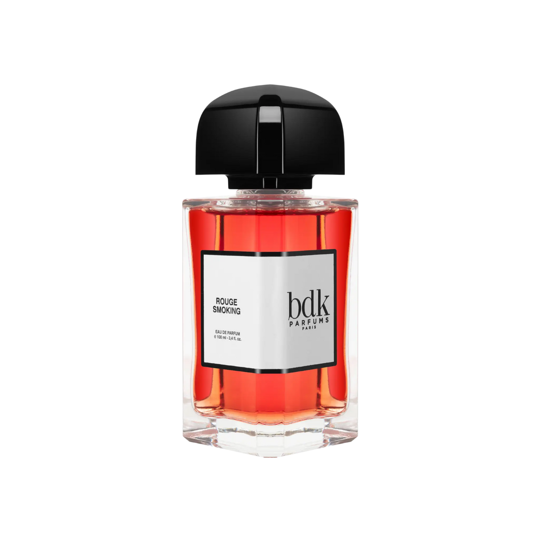 Rouge Smoking Eau de Parfum by BDK Parfums - side view of unisex niche amber fruity spicy red fragrance bottle with bdk Parfums label