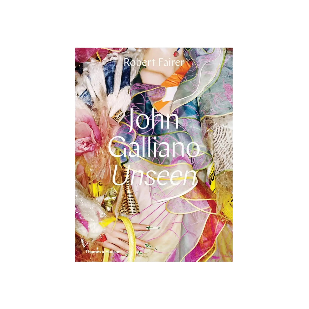 John Galliano Unseen fashion book by Robert Fairer featuring colorful haute couture imagery on cover, luxury coffee table book for fashion lovers