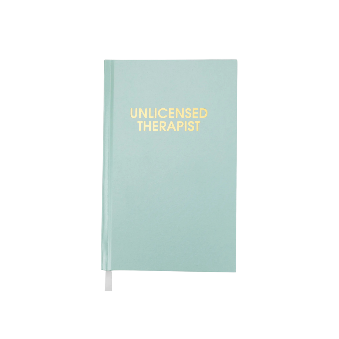 Aqua hardcover journal titled Unlicensed Therapist with gold lettering displayed closed on a clean background
