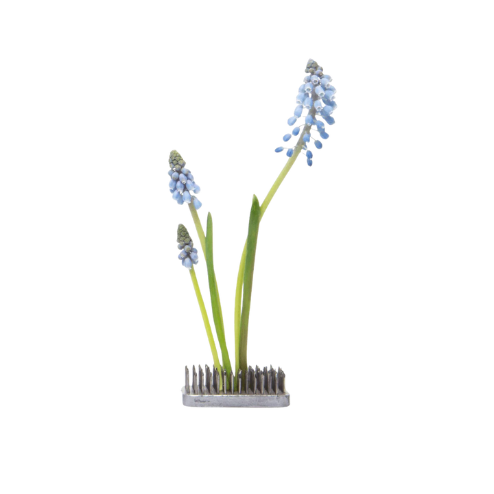 Kenzan metal floral frog for ikebana flower arranging displayed with Artichoke Ceramic Vase at Mood by DMJ in Lafayette, Louisiana.