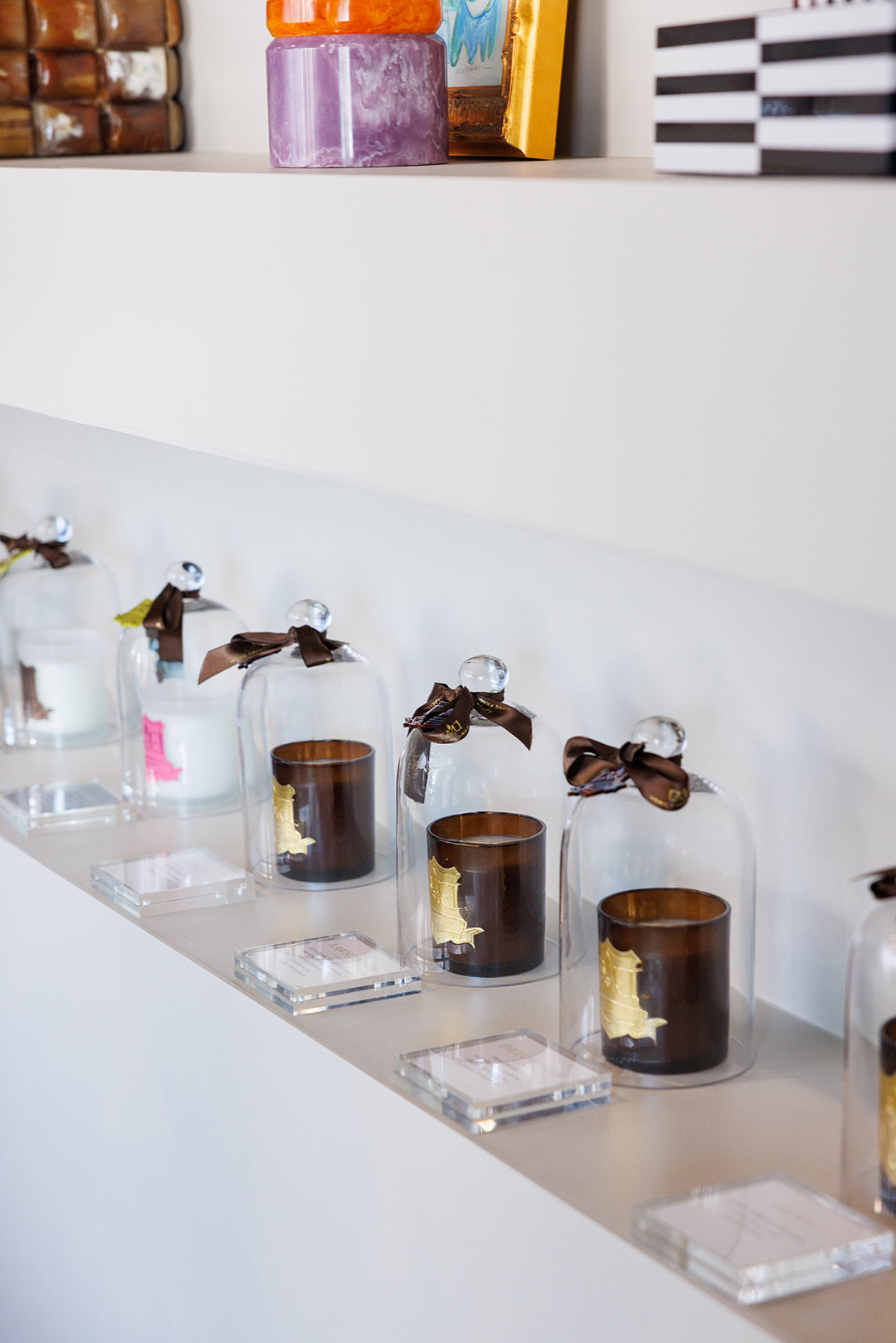 dmj candles on display in mood