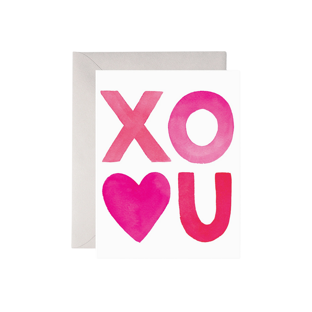 Greeting card with 'XO U' in pink on a white background