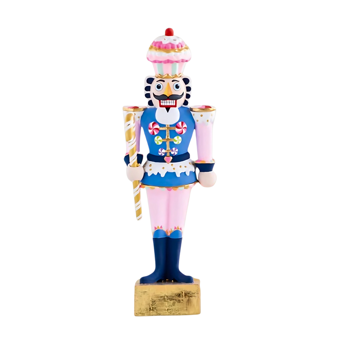 Mood by DMJ Glitterville Rainbow Colonel Cupcake Christmas ornament with rainbow detail and hand-painted finish — playful and collectible holiday décor