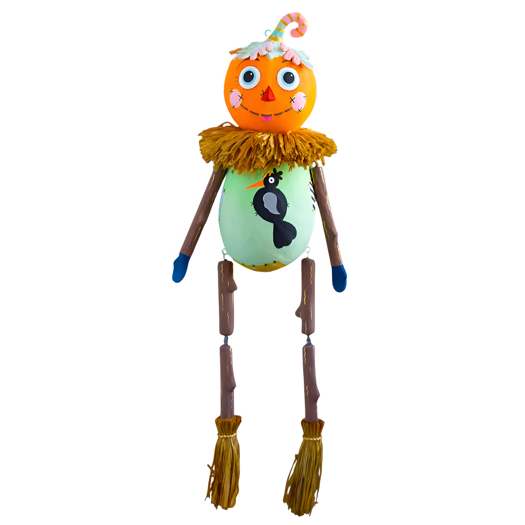 Decorative Halloween Baby Squash figure with a pumpkin head, green body, and broom legs Holiday Decor Mood 2025