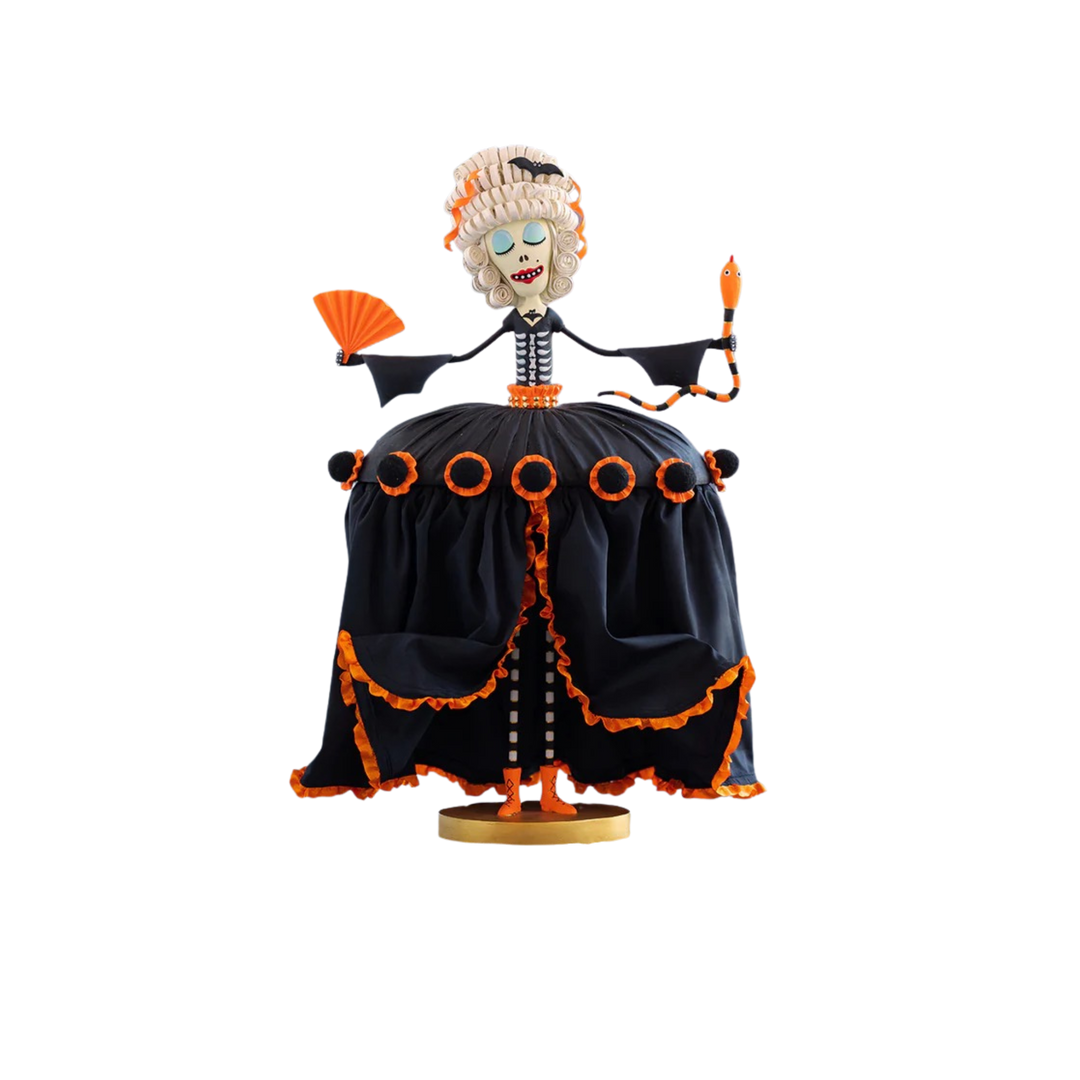 Animated Marie Bone-Toinette character figurine with a black and orange dress on a white background. Glitterville at Mood by DMJ in Lafayette, LA.
