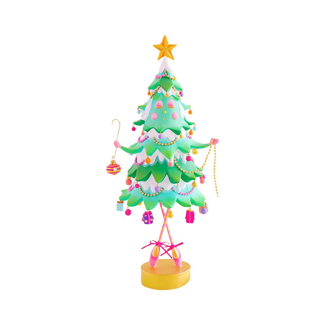 Mood by DMJ Glitterville “Pinesy on Point” whimsical tabletop Christmas figurine — pastel mint and white stylized pine tree with gold star topper, dangling pastel ornament balls, draped garland, and ballet-slipper base