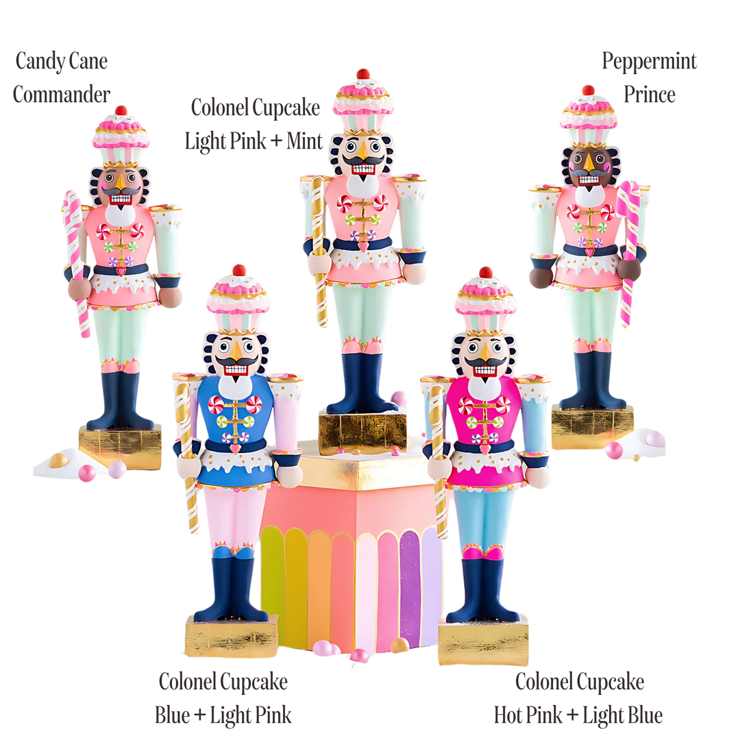 Mood by DMJ Glitterville Rainbow Colonel Cupcake holiday tabletop figures in inclusive skin tones with vibrant rainbow accents — whimsical collectible Christmas décor