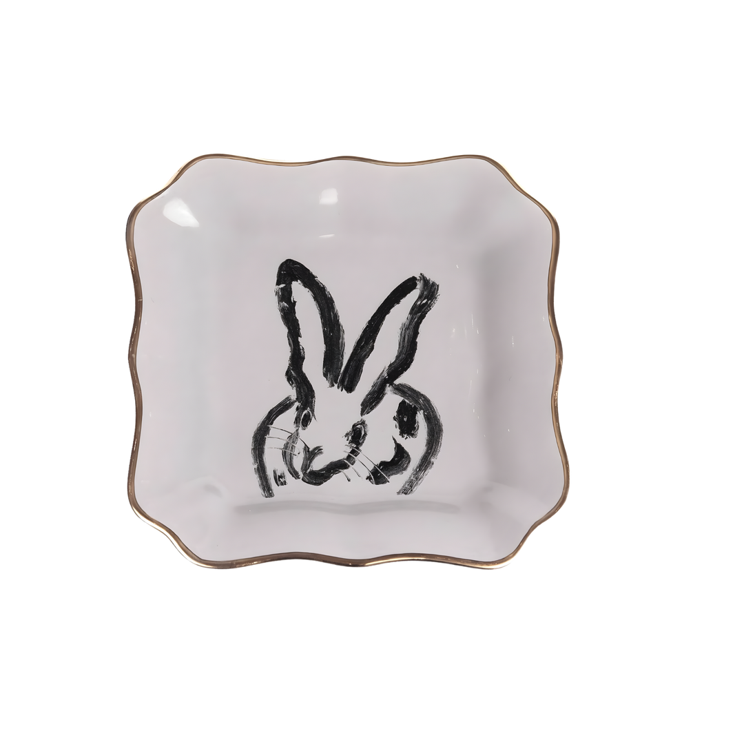 Hunt Slonem grey bunny portrait porcelain plate with gold rim styled as luxury tabletop décor