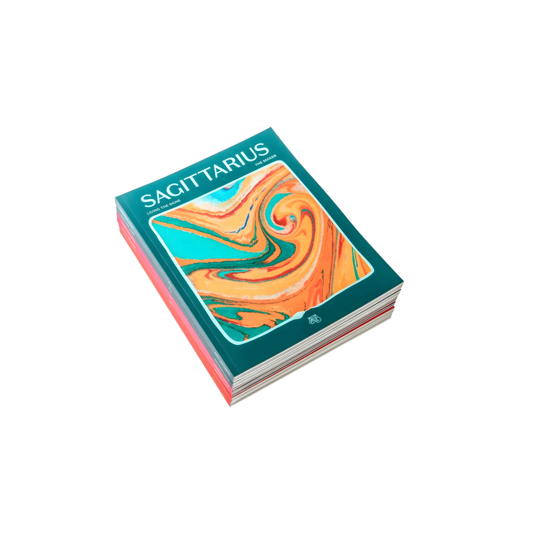 Book titled 'Sagittarius' with colorful design on a white background Mood by DMJ in Lafayette, Louisiana