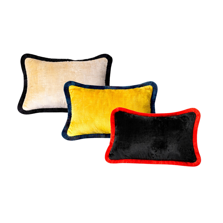 Velvet fringe trim throw pillow by Les Ottomans in off-white with black trim, yellow with navy trim, or black with red trim, 16x24 inches
