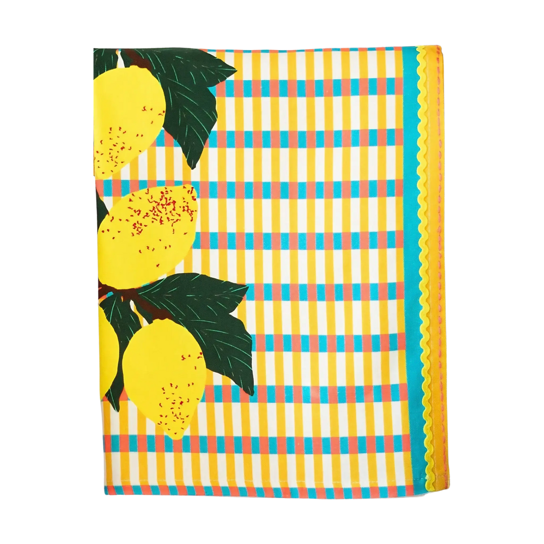 Zest kitchen towel with oversized yellow lemons, colorful check pattern, and rickrack trim displayed folded