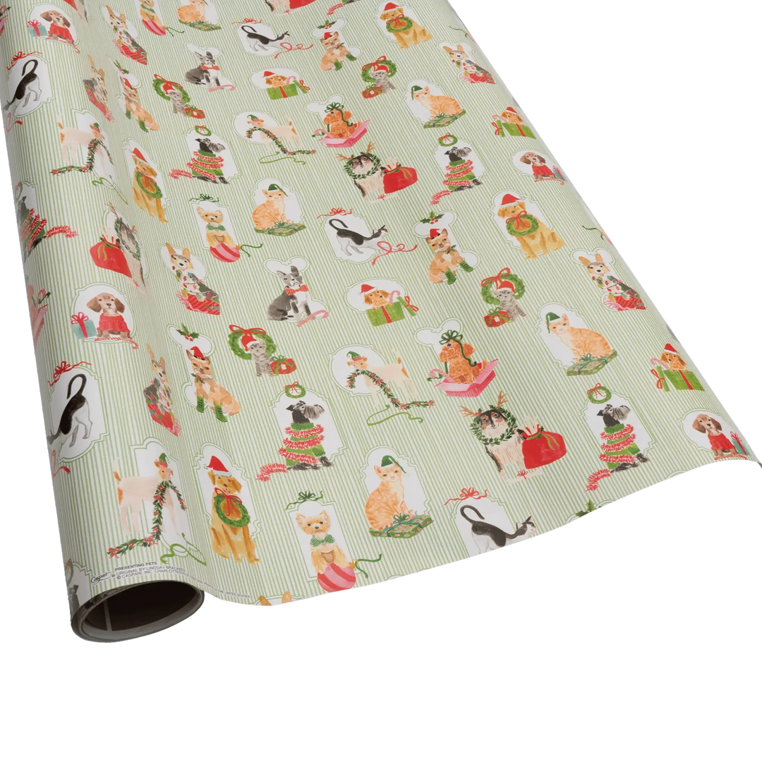 Christmas wrapping paper roll with dogs and cats dressed in festive holiday attire