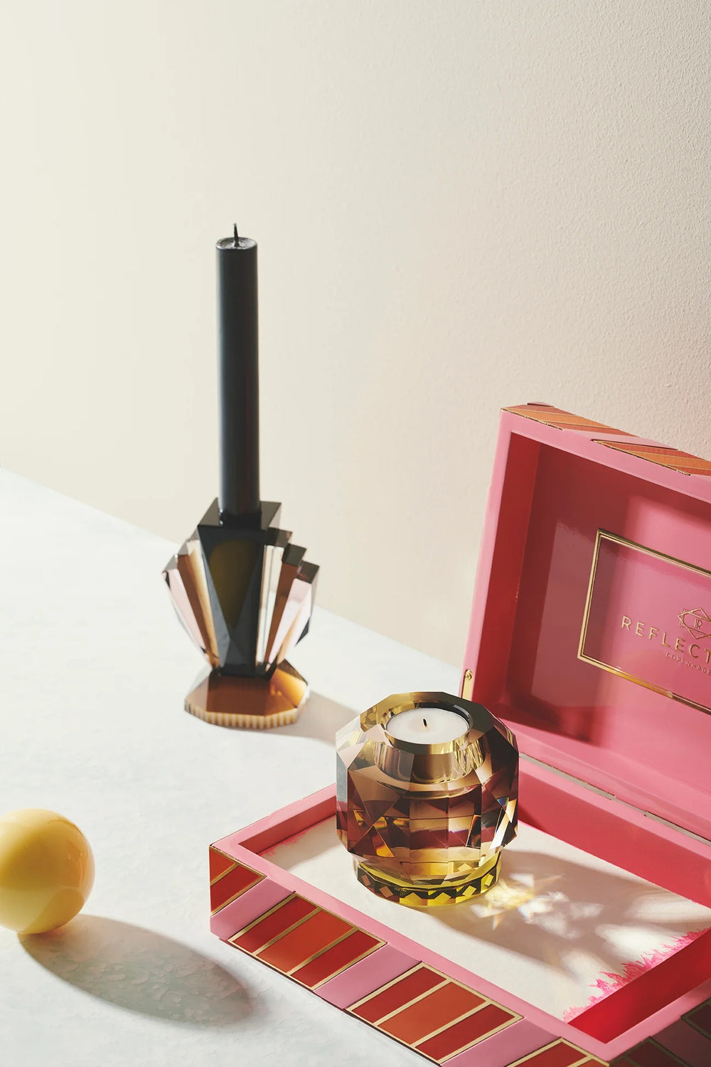 Texas Tealight Holder by Reflections Copenhagen crafted from hand-cut crystal in geometric Art Deco form with colored crystal accents – Mood by DMJ Lafayette, LA.