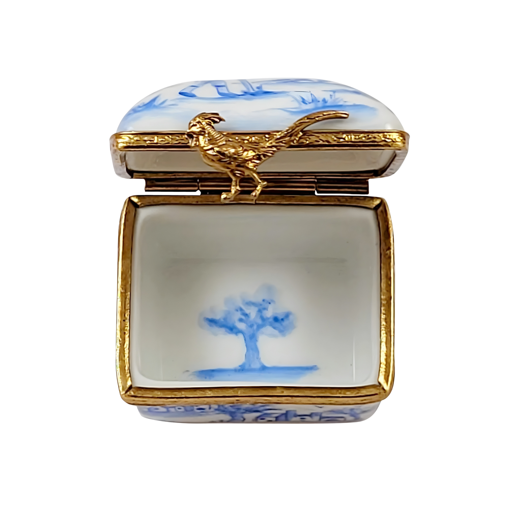 Open Blue Toile Limoges Box showing hand painted interior and sculpted gold clasp