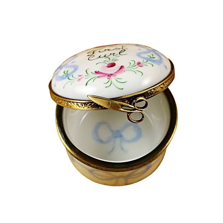 Open Blue Baby’s First Curl Limoges Box showing hand painted interior and gold hinge detail