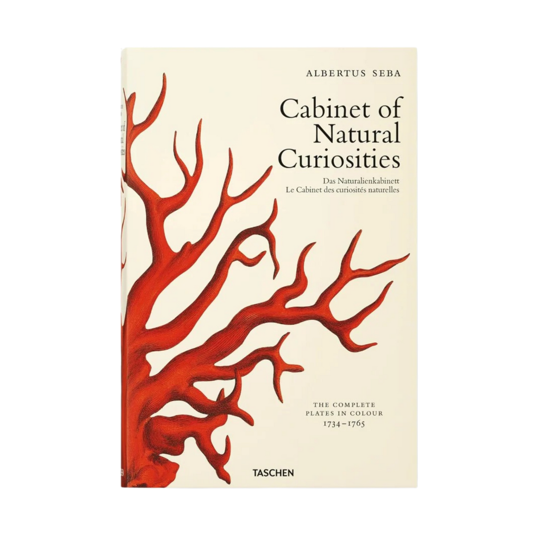 TASCHEN Cabinet of Natural Curiosities XL Edition book cover featuring red coral illustration on a cream background, luxury natural history coffee table book