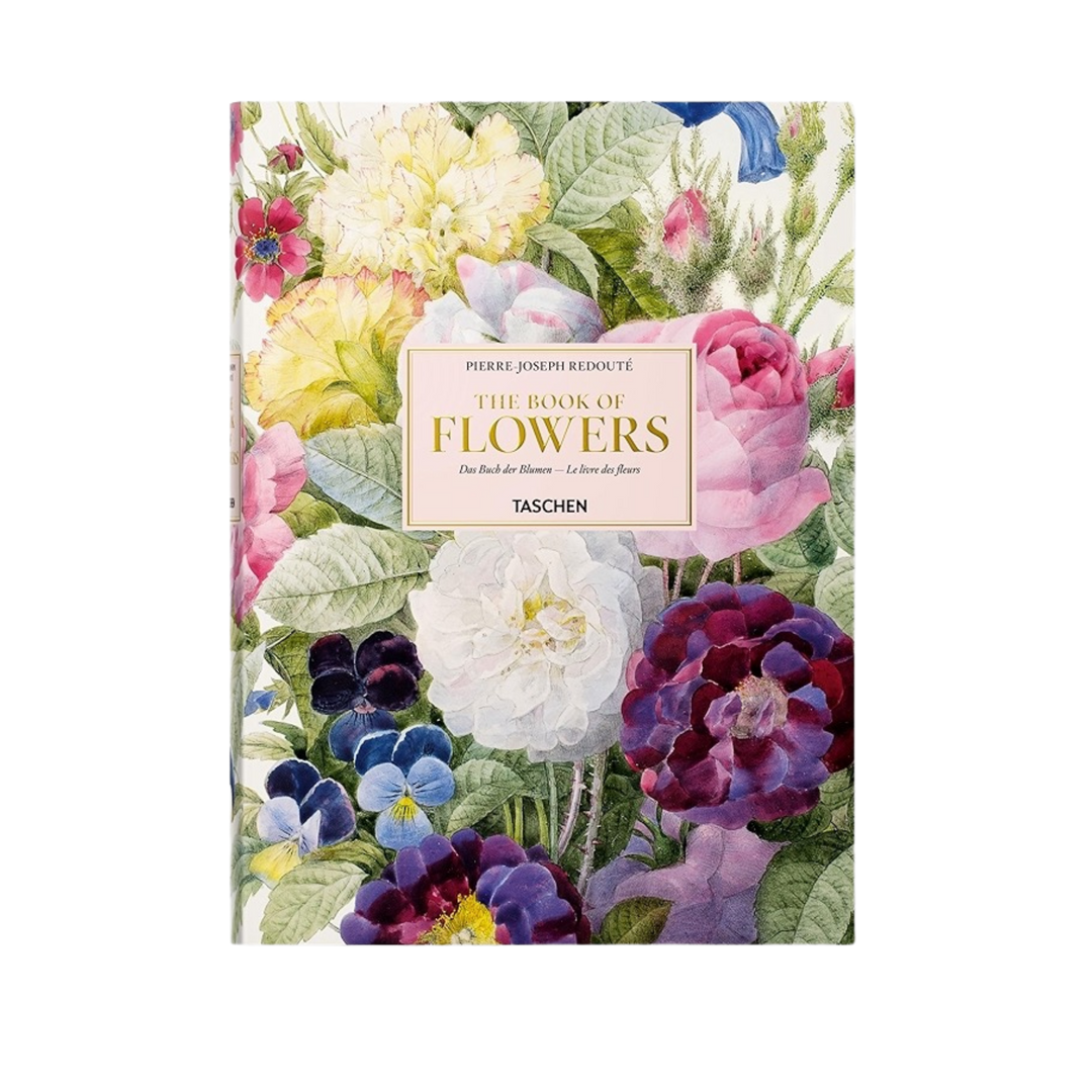 The Book of Flowers by Pierre-Joseph Redouté featuring colorful botanical illustrations on cover, a luxury Taschen coffee table art book