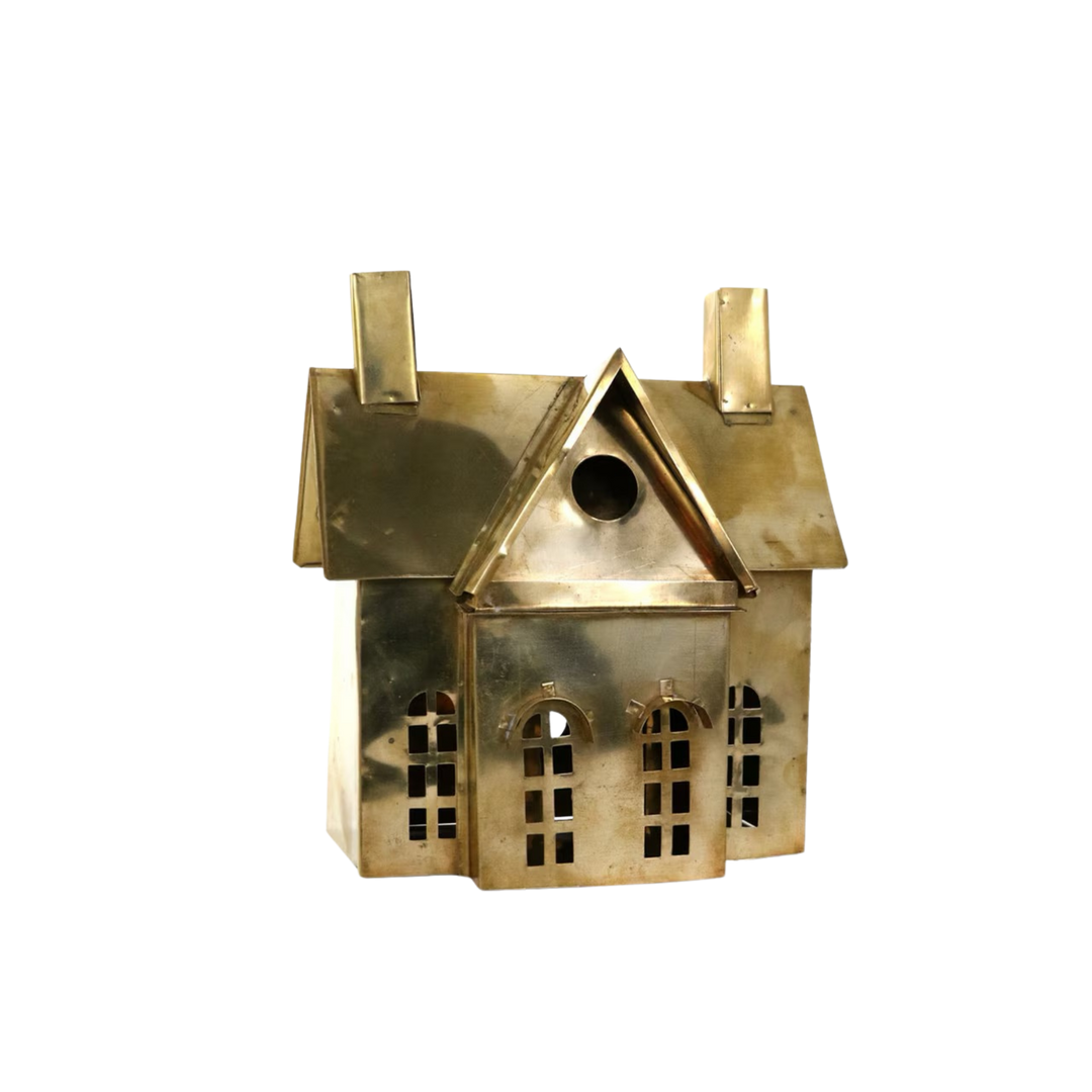 Cody Foster Brass Cottage Christmas village house, polished brass cottage with twin chimneys, center gable, and arched cutout windows