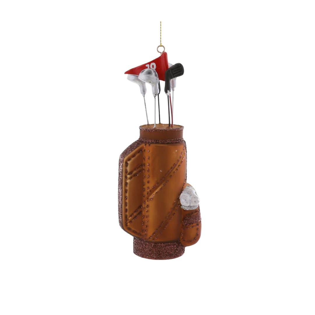 Cody Foster golf bag glass Christmas ornament, brown golf bag with silver clubs, red flag, and white golf ball