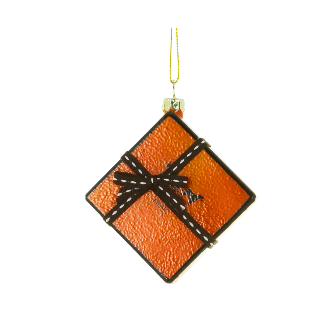 Cody Foster orange glass luxury gift box Christmas ornament with pebbled texture and brown stitched ribbon bow
