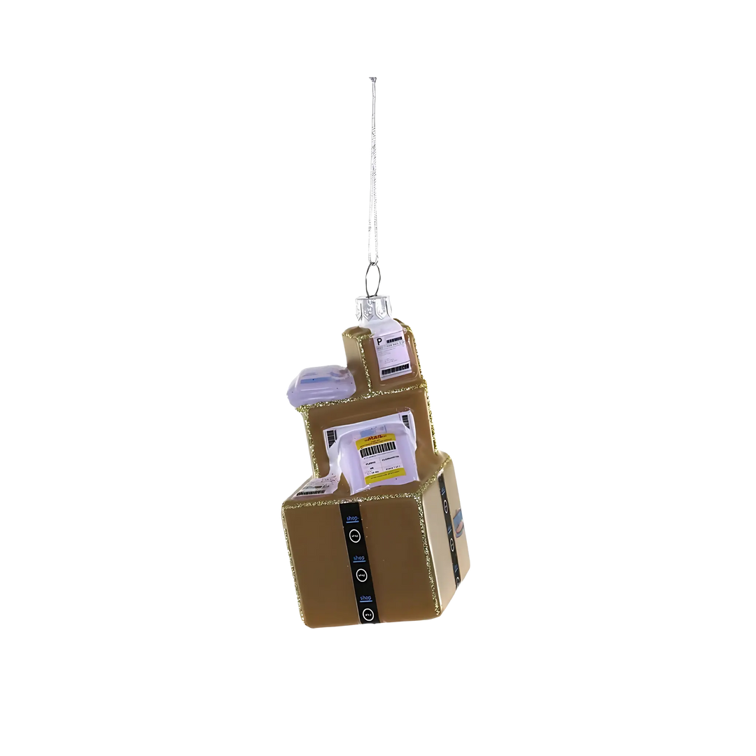 Cody Foster online shopper ornament from Mood by DMJ, playful glass decoration featuring stacked packages, modern holiday décor