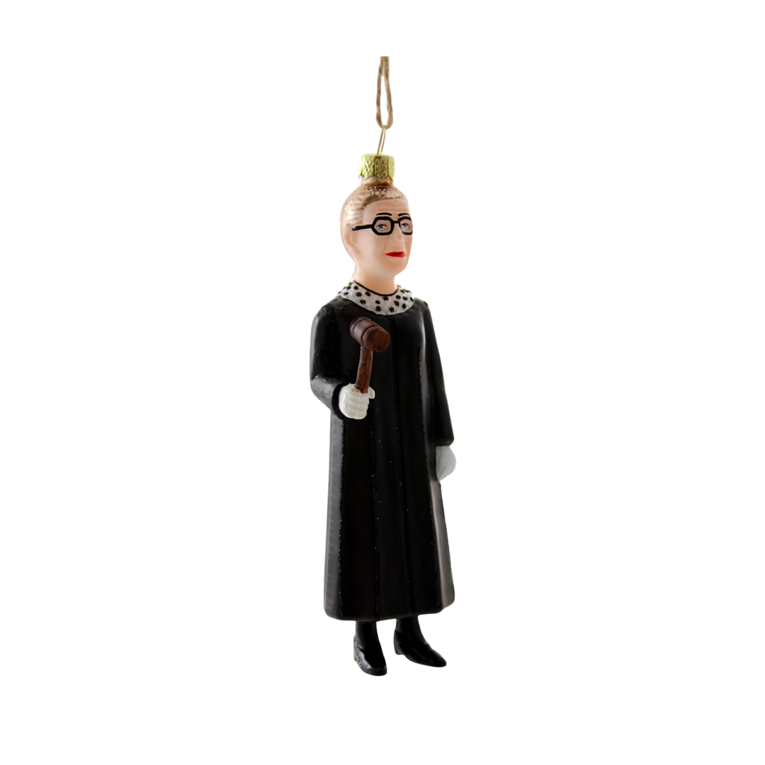 Cody Foster Ruth Bader Ginsburg Christmas ornament from Mood by DMJ, glass figure in a black judicial robe with a white lace collar, round