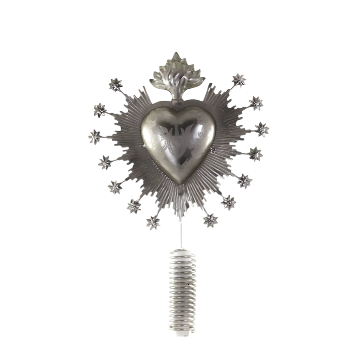 Cody Foster Sacred Heart Tree Topper in silver from Mood by DMJ, a milagro-inspired Christmas tree topper with starburst and glitter details