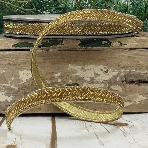 D. Stevens gold bead chevron garland from Mood by DMJ, half inch wide strand of faceted gold beads in a chevron pattern for trees and mantels