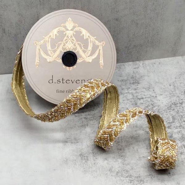 D. Stevens gold beaded jewel chevron glam trim from Mood by DMJ, 1 inch wide gold beaded chevron trim on a d. stevens spool