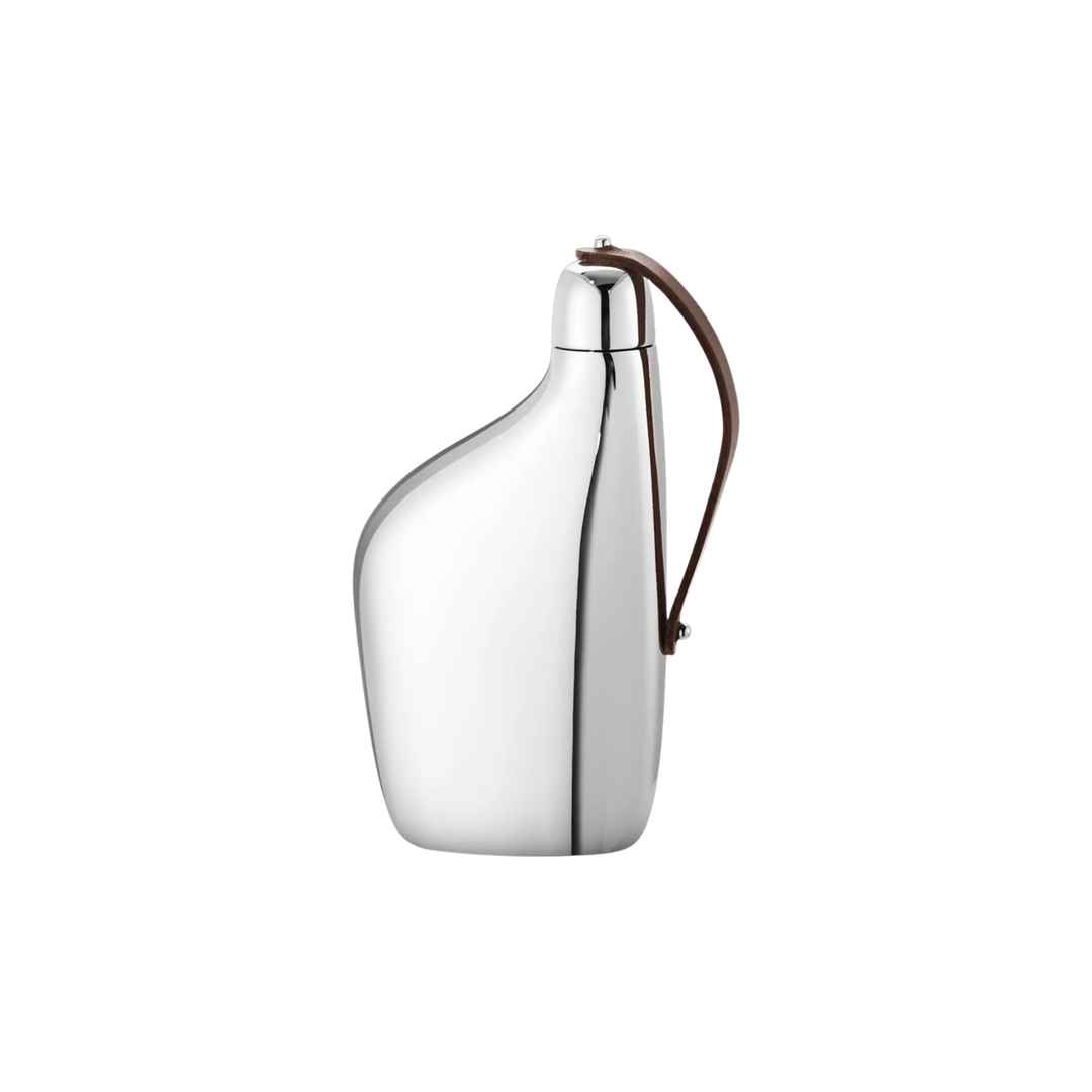 Georg Jensen Sky hip flask in curved mirror-polished stainless steel with leather strap by Aurélien Barbry
