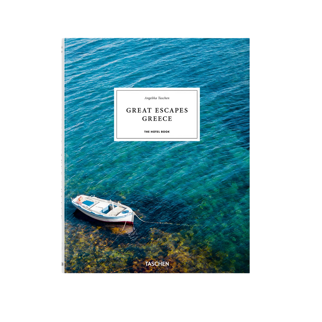 Great Escapes Greece. The Hotel Book by Angelika Taschen, cover with a small white boat on clear turquoise water