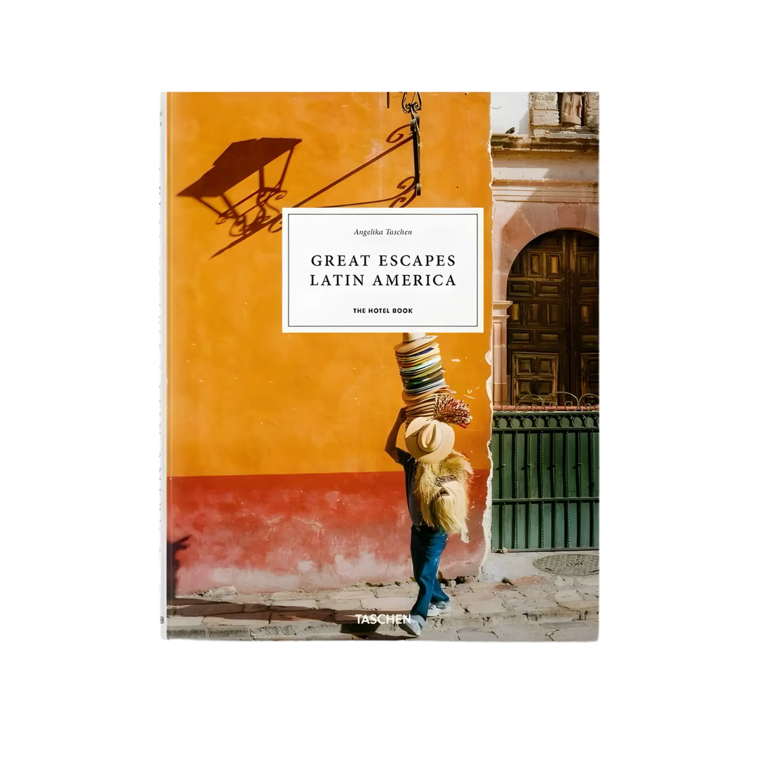 Great Escapes Latin America. The Hotel Book by Angelika Taschen, cover of a sunlit orange colonial street wall