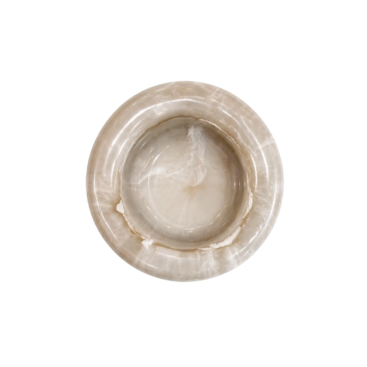 Top-down view of handmade taupe marble resin catch-all bowl by Mood by DMJ