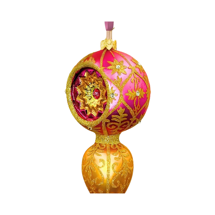 Front of Her Majesty Indent Glass Christmas Ornament in fuchsia and gold with sunburst reflector, handcrafted Polish blown glass from