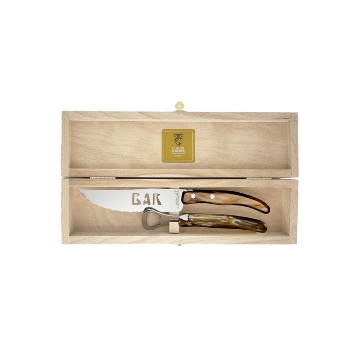 Laguiole Bar Set by Claude Dozorme with cappuccino horn handles — handcrafted French bar tool set including stainless steel bottle opener and serrated bar knife in a wooden gift box. Made in Thiers, France — luxury barware for cocktail enthusiasts.