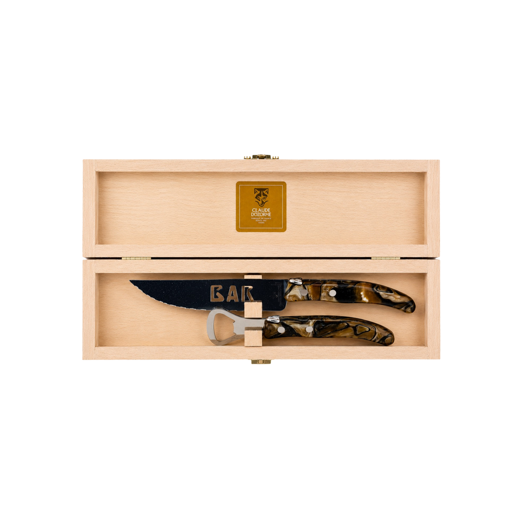 Laguiole Bar Set by Claude Dozorme with smokey quartz handles — handcrafted French bar tool set including stainless steel bottle opener and serrated bar knife in a wooden gift box. Made in Thiers, France — luxury barware for cocktail enthusiasts.