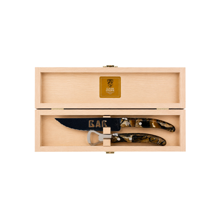 Laguiole Bar Set by Claude Dozorme with smokey quartz handles — handcrafted French bar tool set including stainless steel bottle opener and serrated bar knife in a wooden gift box. Made in Thiers, France — luxury barware for cocktail enthusiasts.