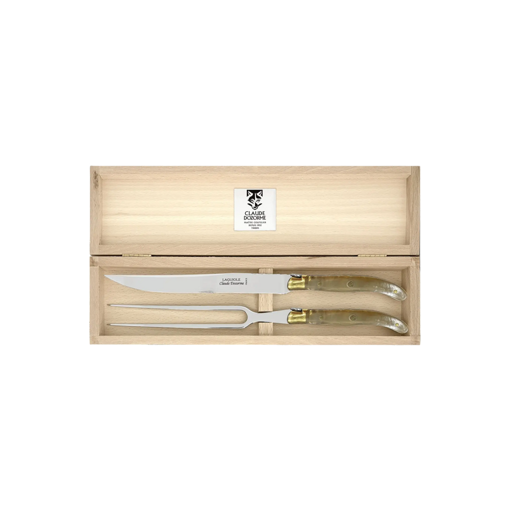 Laguiole Carving Set by Claude Dozorme with light horn (taupe) handles — handcrafted 2-piece French carving knife and fork in a wooden gift box. Made in Thiers, France.