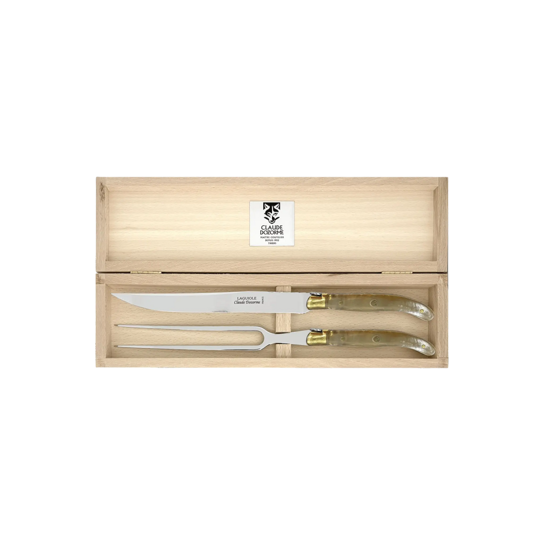 Laguiole Carving Set by Claude Dozorme with light horn (taupe) handles — handcrafted 2-piece French carving knife and fork in a wooden gift box. Made in Thiers, France.