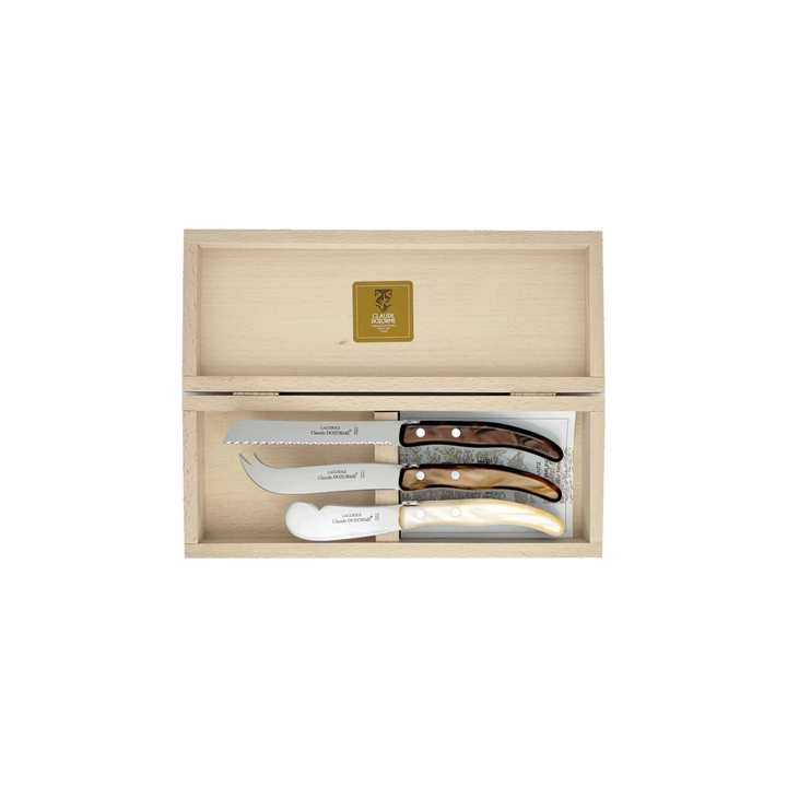 Laguiole Cheese Set by Claude Dozorme with natural brown wood handles — handcrafted 3-piece French cheese knife, slicer, and spreader in a wooden gift box. Made in Thiers, France — luxury cheese board accessories for entertaining and gifting.