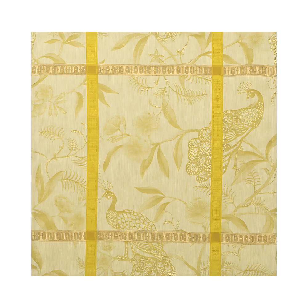 Le Jacquard Français A L'Orangerie linen dinner napkin in mustard from Mood by DMJ, yellow French linen napkin with peacocks