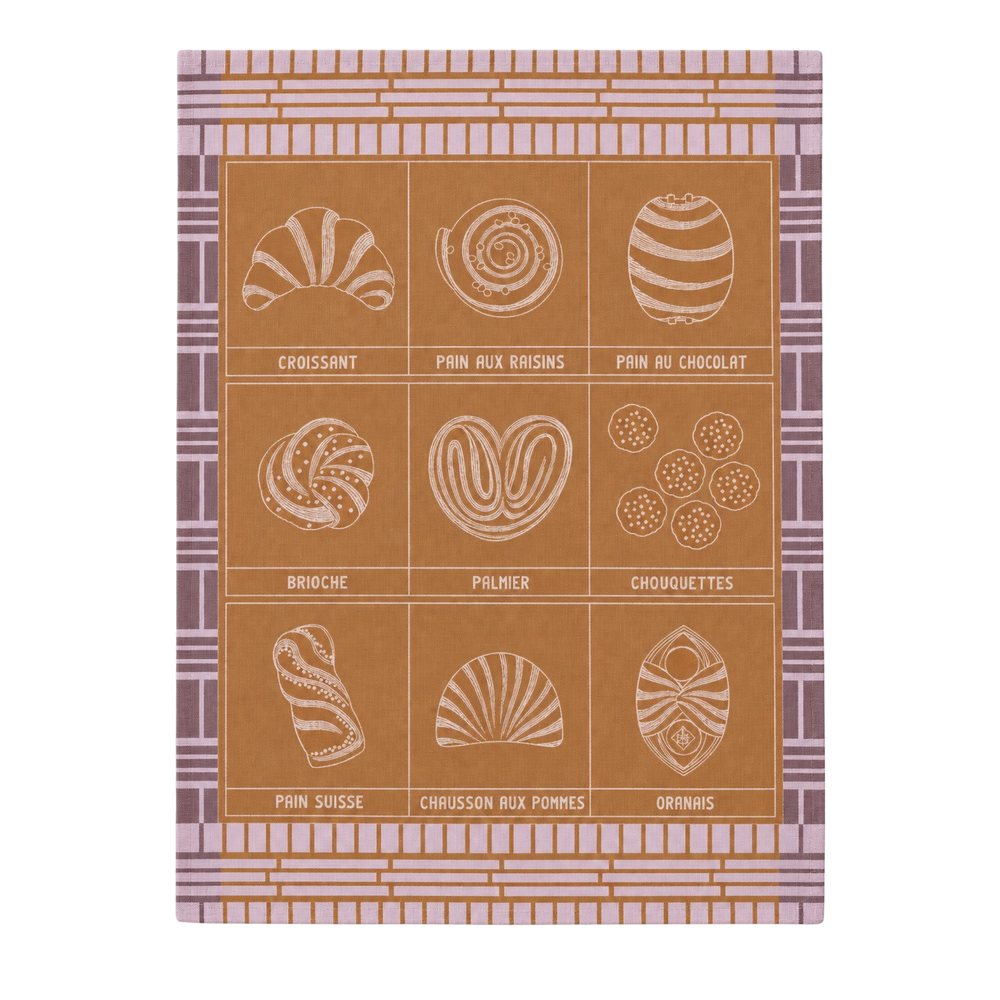 Le Jacquard Français fine pastry tea towel in purple from Mood by DMJ, caramel and lavender cotton kitchen towel with French pastries
