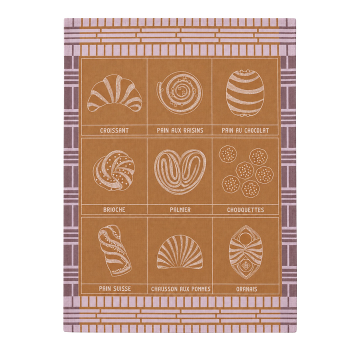 Le Jacquard Français fine pastry tea towel in purple from Mood by DMJ, caramel and lavender cotton kitchen towel with French pastries
