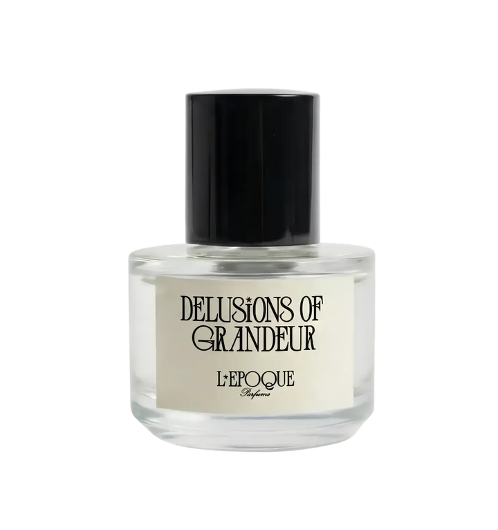 Clear glass bottle of Delusions of Grandeur Eau de Parfum by L&