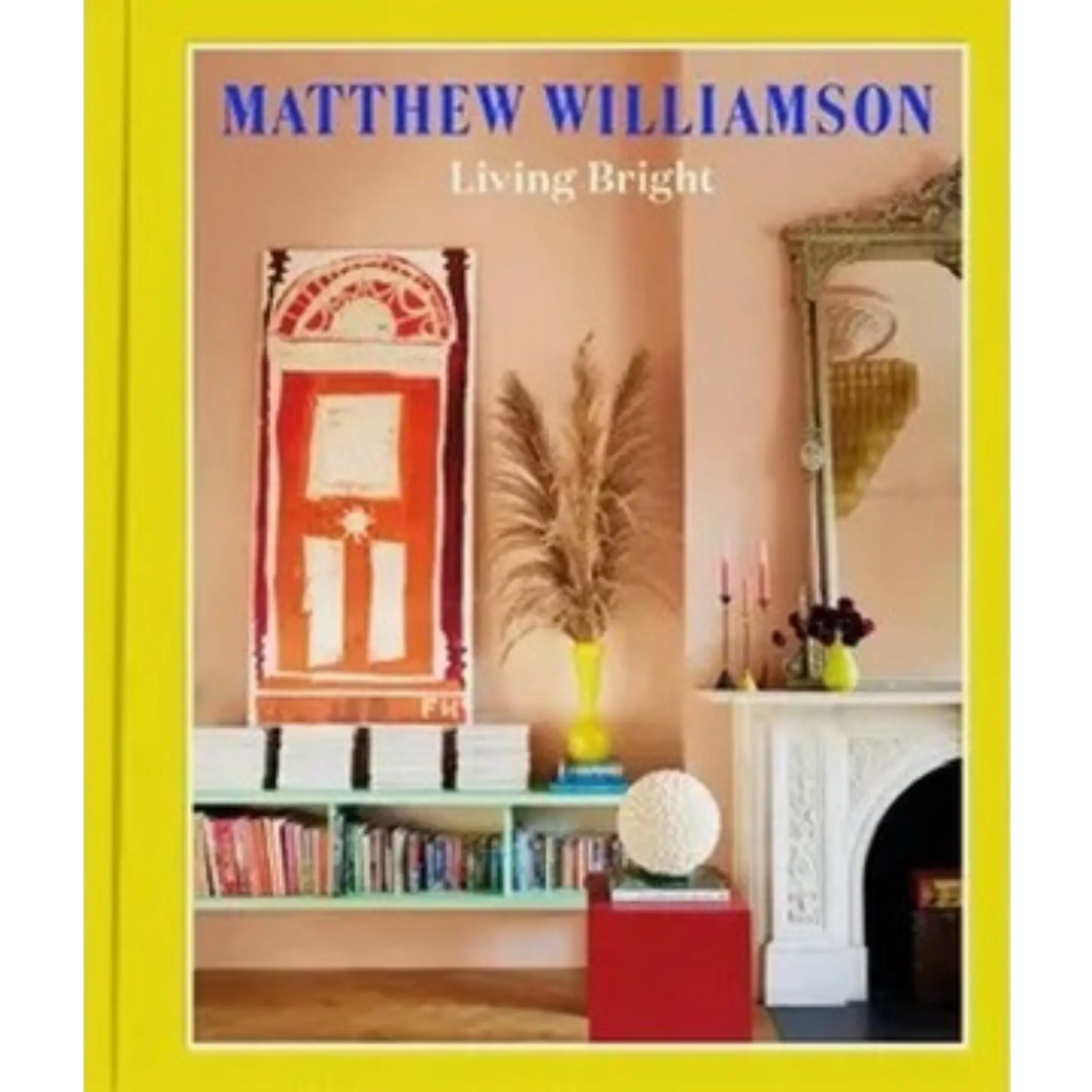 Front cover of Living Bright by Matthew Williamson, a Chronicle Chroma book with a bright yellow border and colorful room