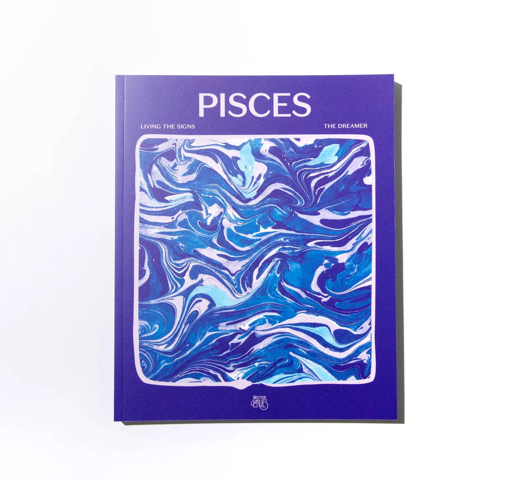 Front cover of Living the Signs: Pisces, The Dreamer, a violet paperback with blue marbled art by In Case of Emergence