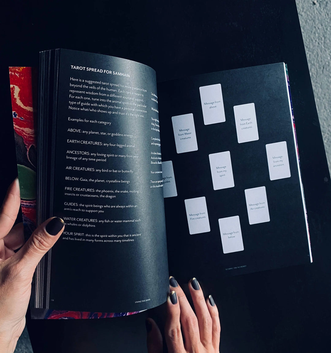 Living the Signs: Scorpio workbook open to a tarot spread page with card layout diagram