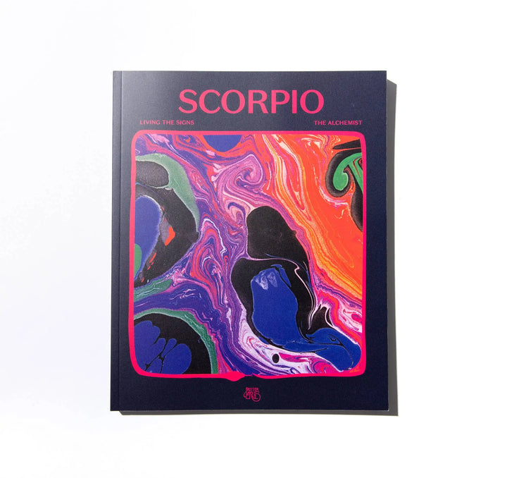 Front cover of Living the Signs: Scorpio, The Alchemist, a navy paperback with vivid marbled art by In Case of Emergence